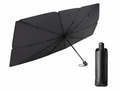 Black umbrella and its folded case on a white background